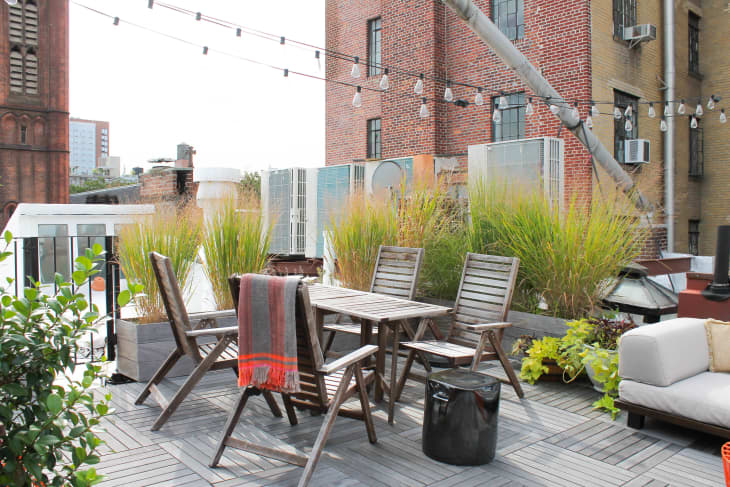 Hanging string lights on apartment patio sales